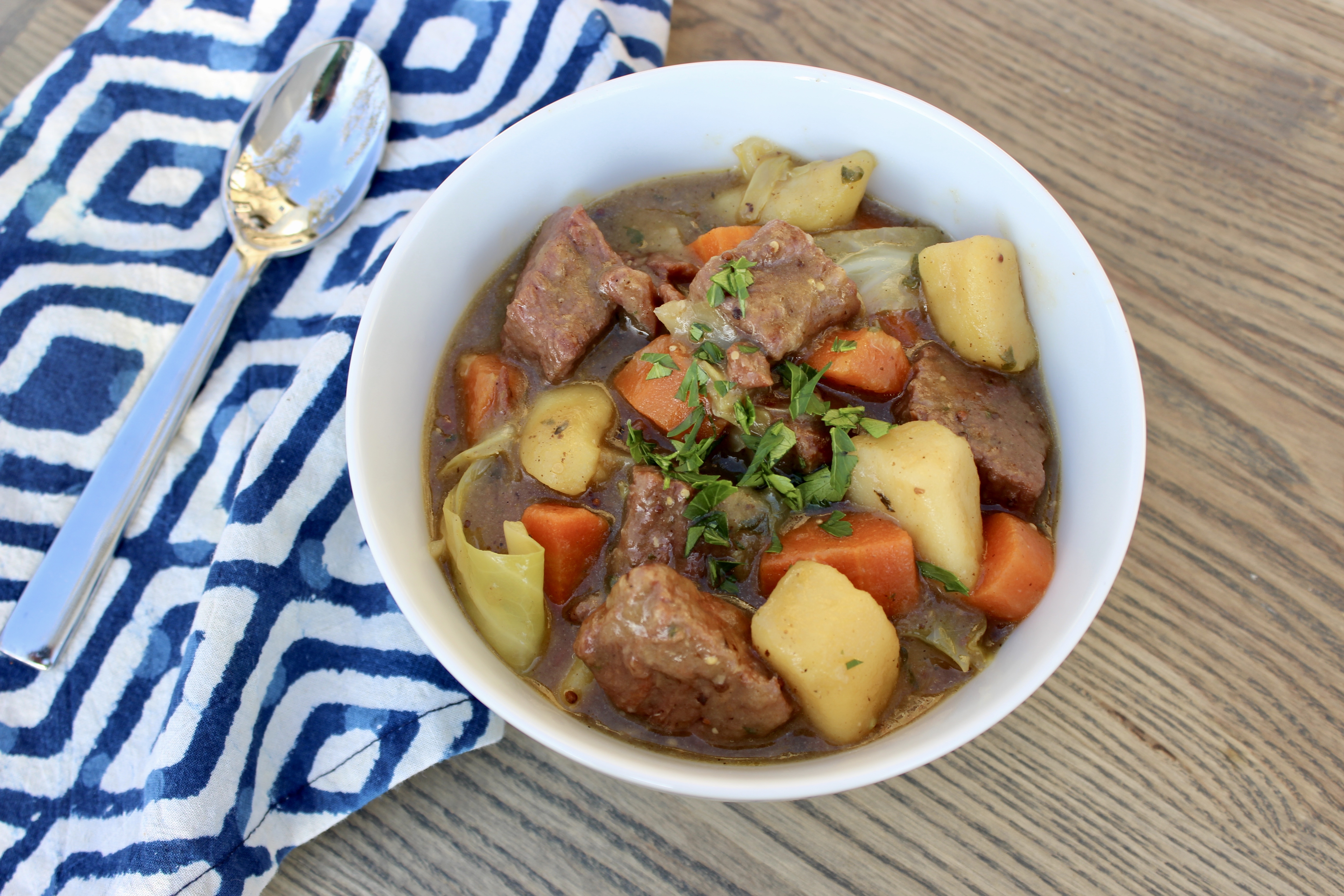 Corned Beef, Cabbage, and Guinness Stew JuicyBites
