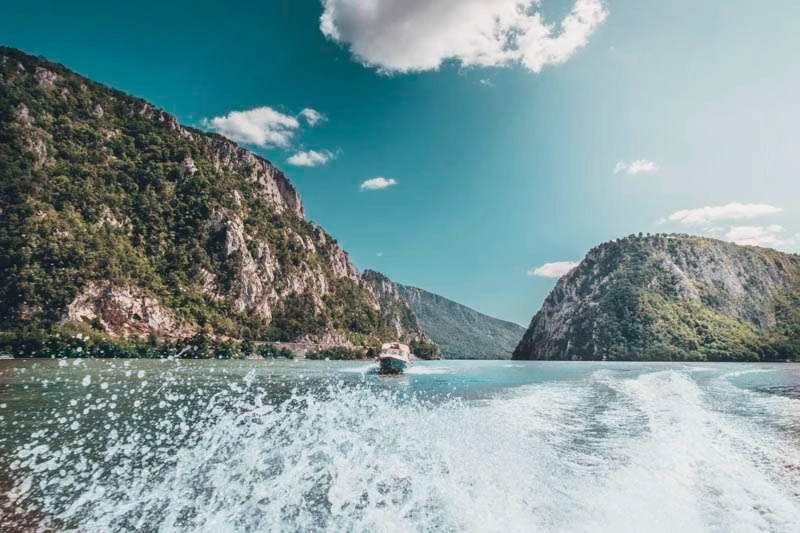 Bucharest to Danube valley road trip places to see in romania cazanele dunarii Danube gorges Dobova motor boat tour