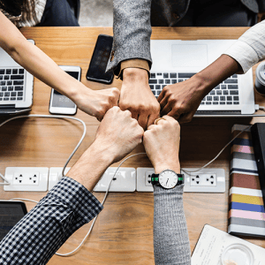 Business people hands in center