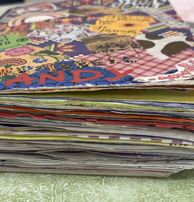 Real decorated student composition book used as a personal creative memory journal.