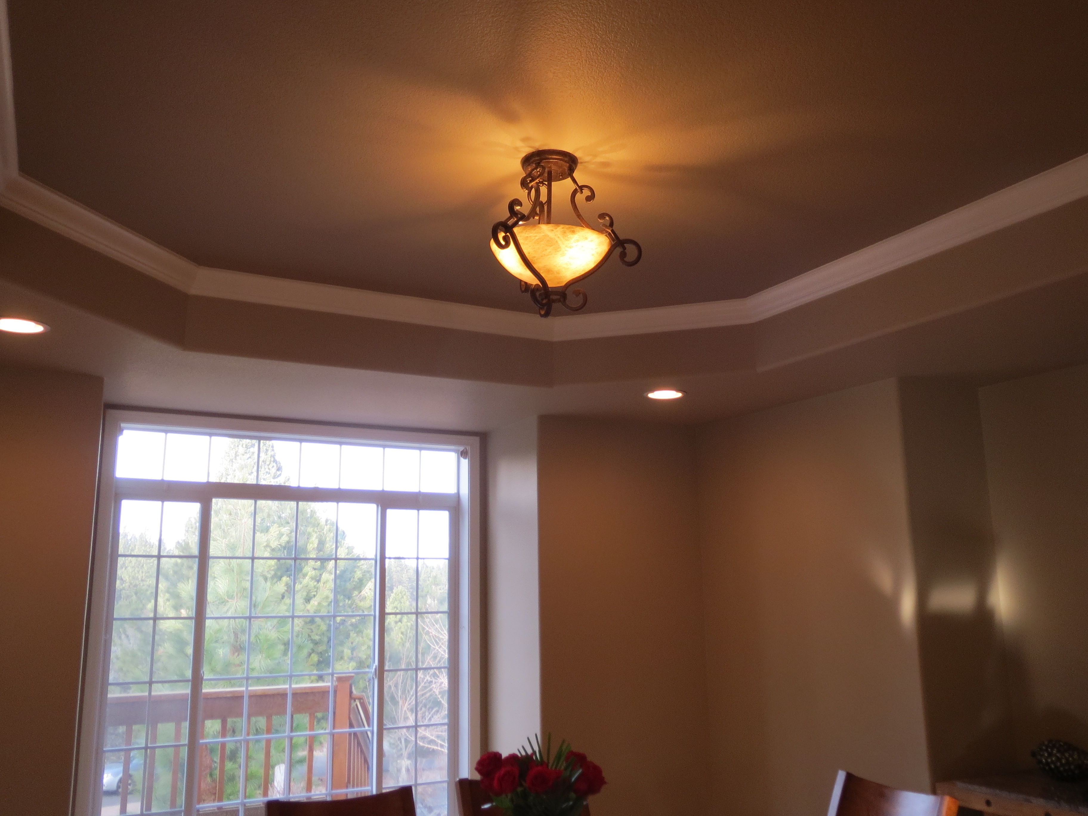 Tray ceiling with darker color for extra drama.