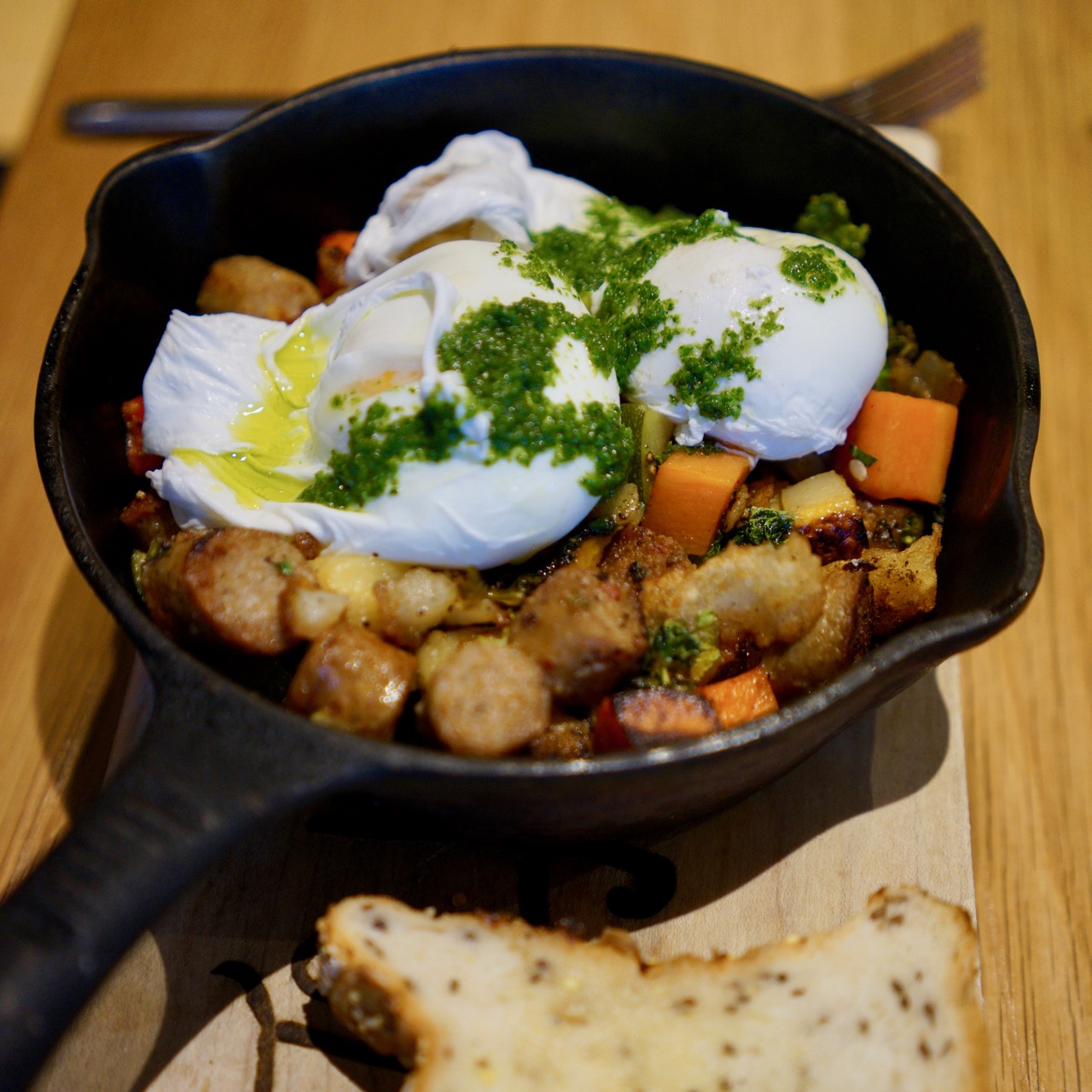 Breakfast Skillet: Two Rivers turkey sausage hash with roasted vegetables, free-range eggs and watercress pesto