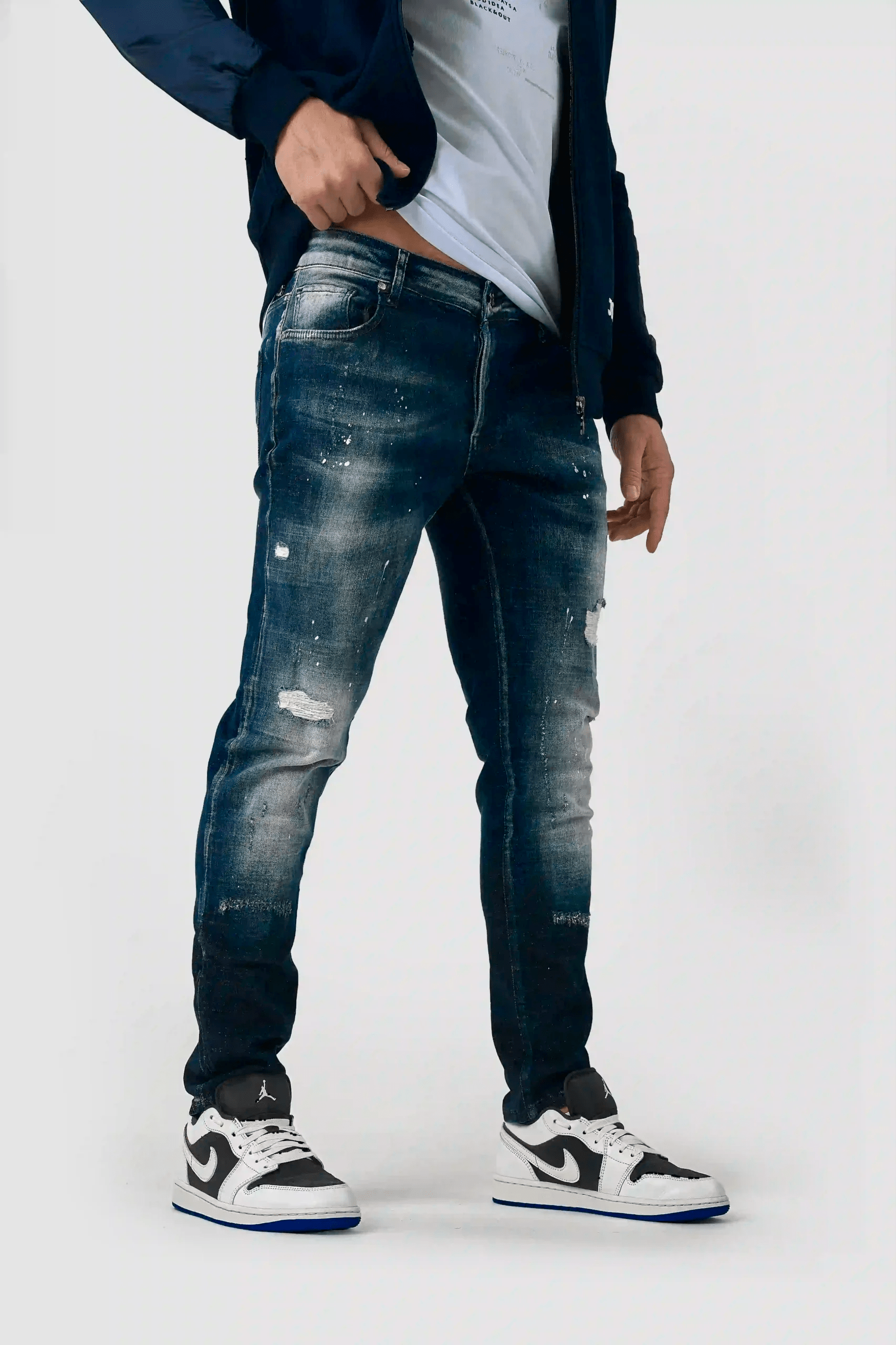 SLIM FIT KAVBOJKE SPRANEGA VIDEZA