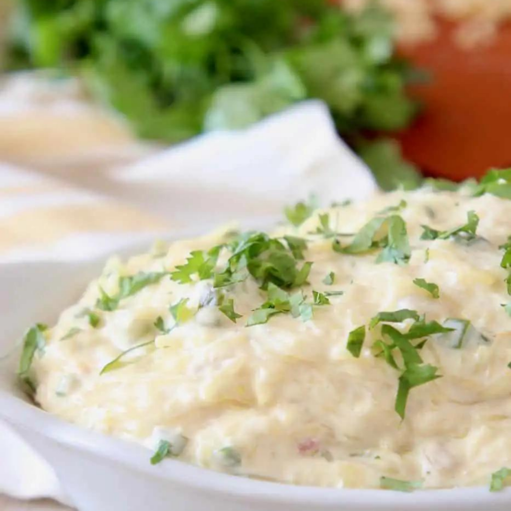 jalapeno popper spaghetti squash in a white bowl