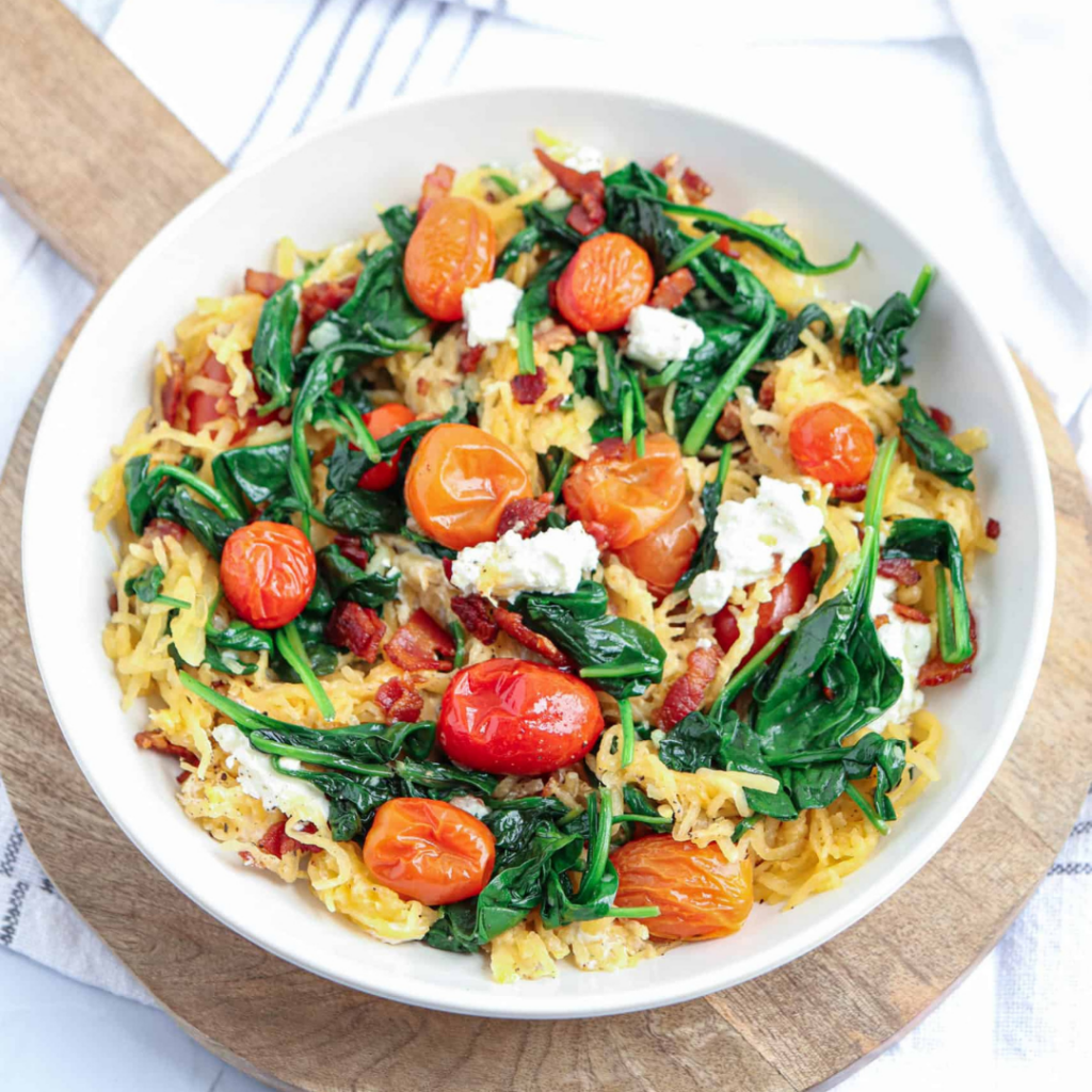 Spaghetti squash with bacon, goat cheese & spinach skillet