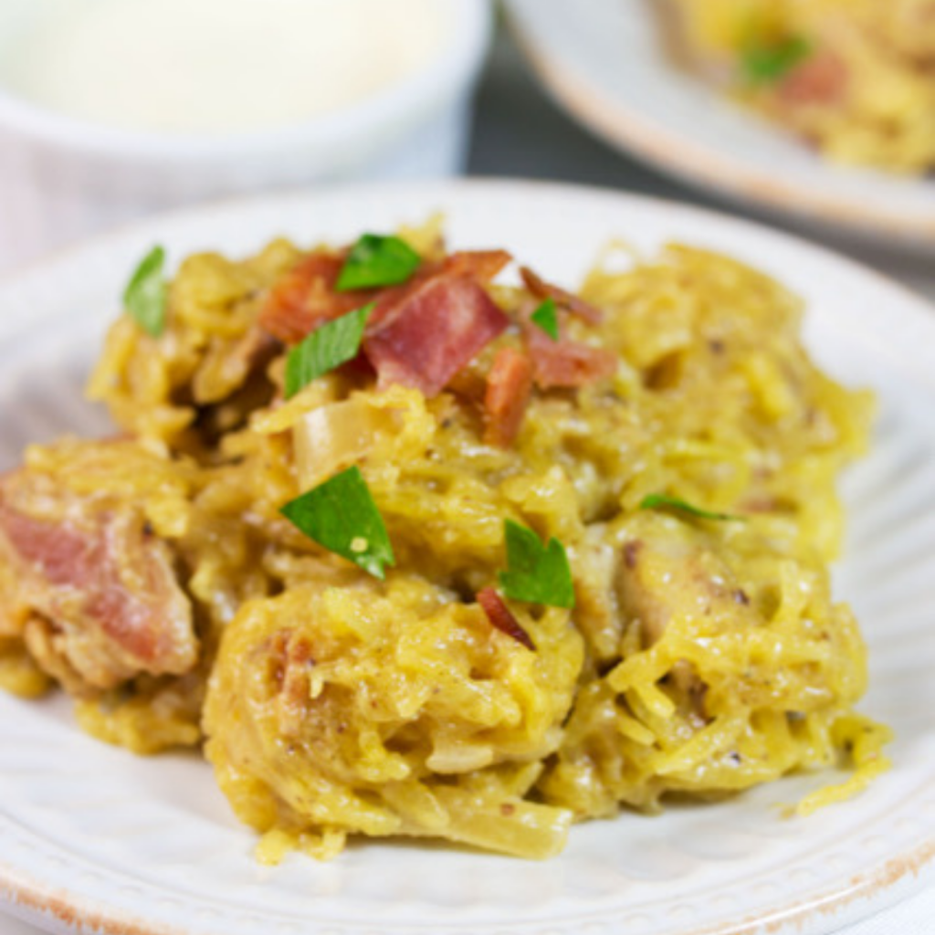 spaghetti squash carbonara on a white plate