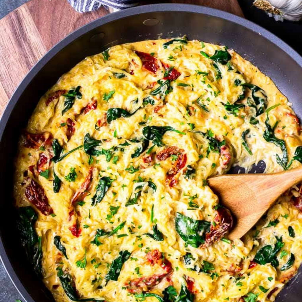 tuscan spaghetti squash in a black pan