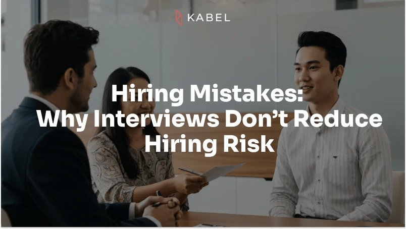 Three people in a professional office setting conduct a job interview, with text reading, "Hiring Mistakes: Why Interviews Don’t Reduce Hiring Risk. Kabel Job Platform