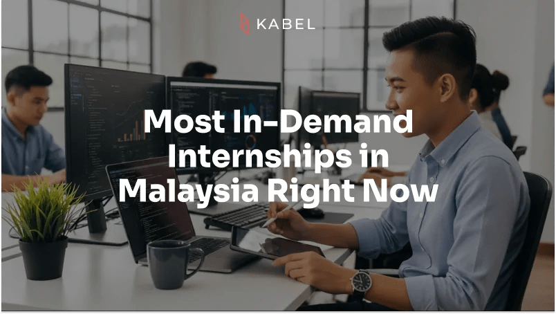 A young man works at a computer in a modern office. Text on image reads: "Most In-Demand Internships in Malaysia Right Now. Kabel Job Platform