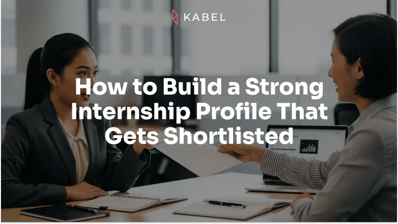 Two women in business attire sit at a table discussing documents, with text overlay: "How to Build a Strong Internship Profile That Gets Shortlisted. Kabel Job Platform