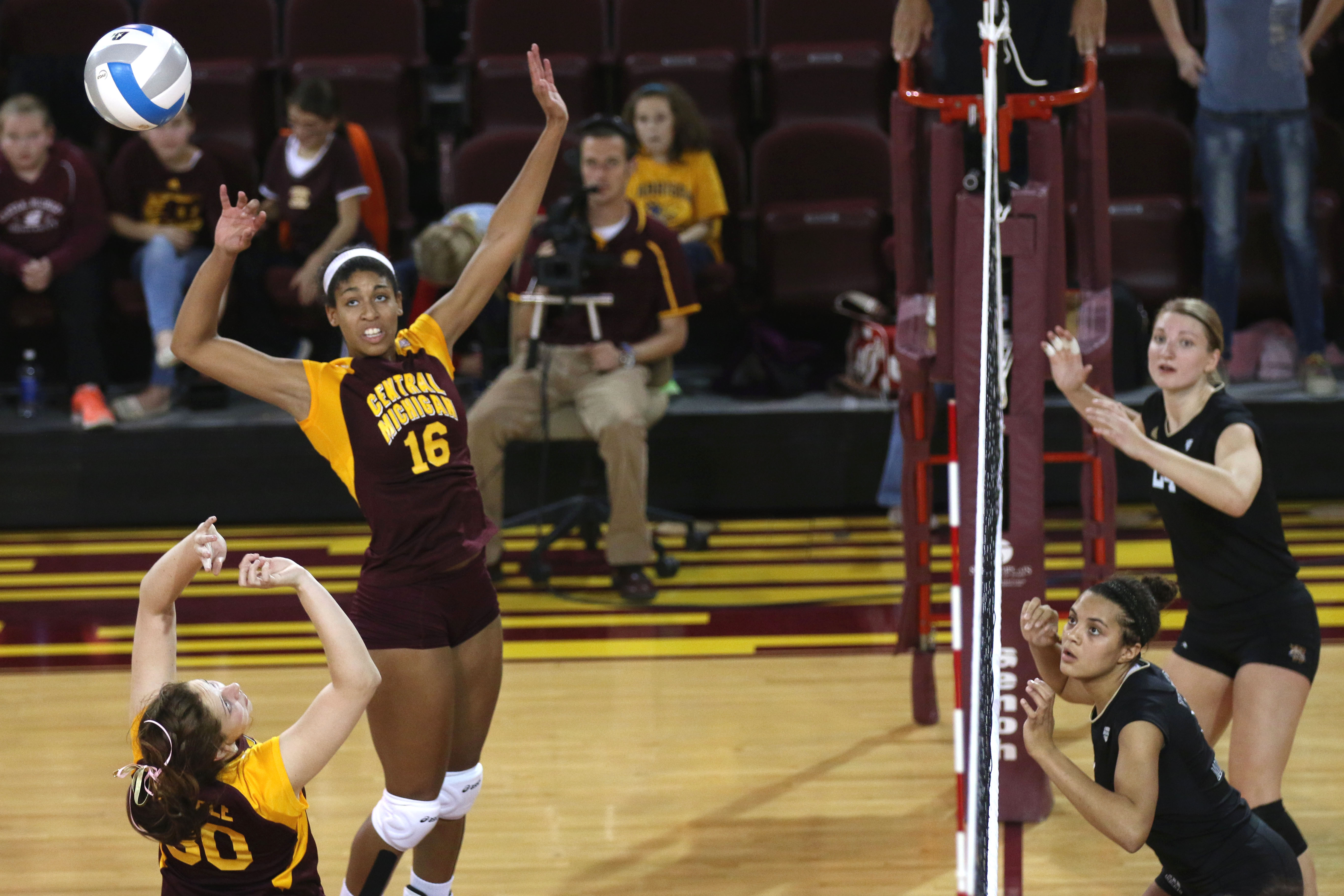 Angelique Barker prepares for a hit at the CMU volleyball game Friday October 10, 2014.