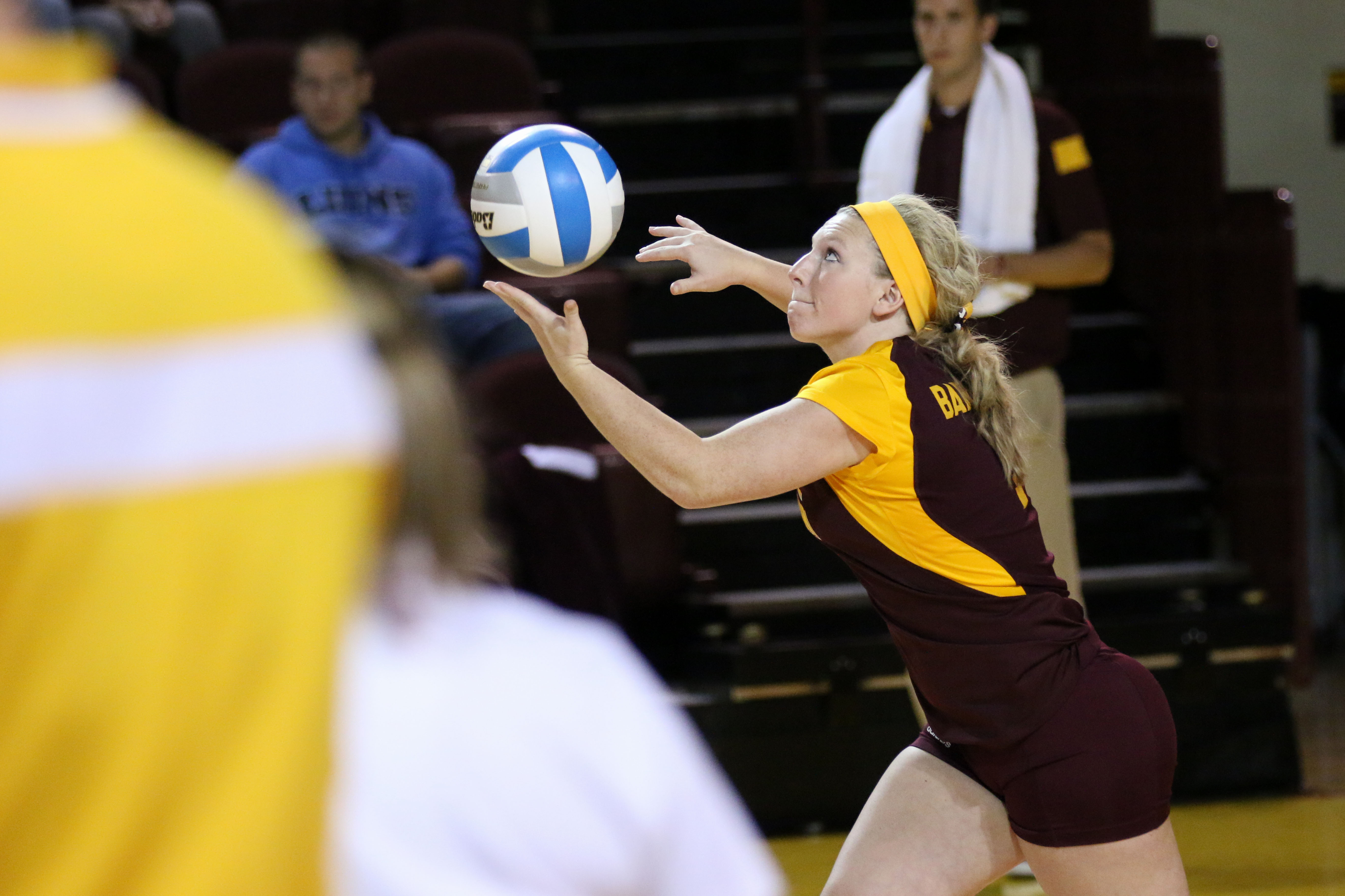 Hayley Barker, defensive specialist, serves the ball at the CMU volleyball game Friday October 10, 2014.
