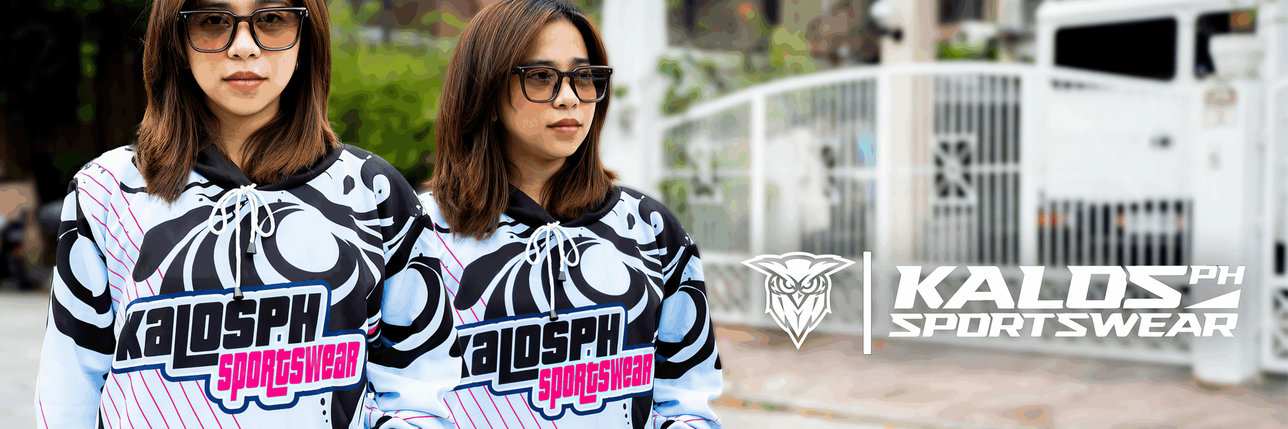 Two women wearing matching black and white custom hoodies with the "Kalosph Sportswear" logo, representing stylish custom apparel available in Marikina, Philippines.