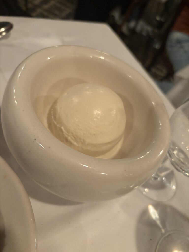 From the Menu at Parrilla Don Julio Buenos Aires: Vanilla ice cream ball in a white bowl.