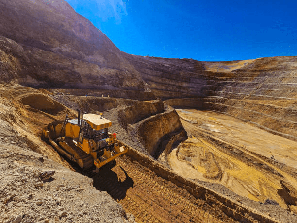 construction machinery working in open pi mine in australia.