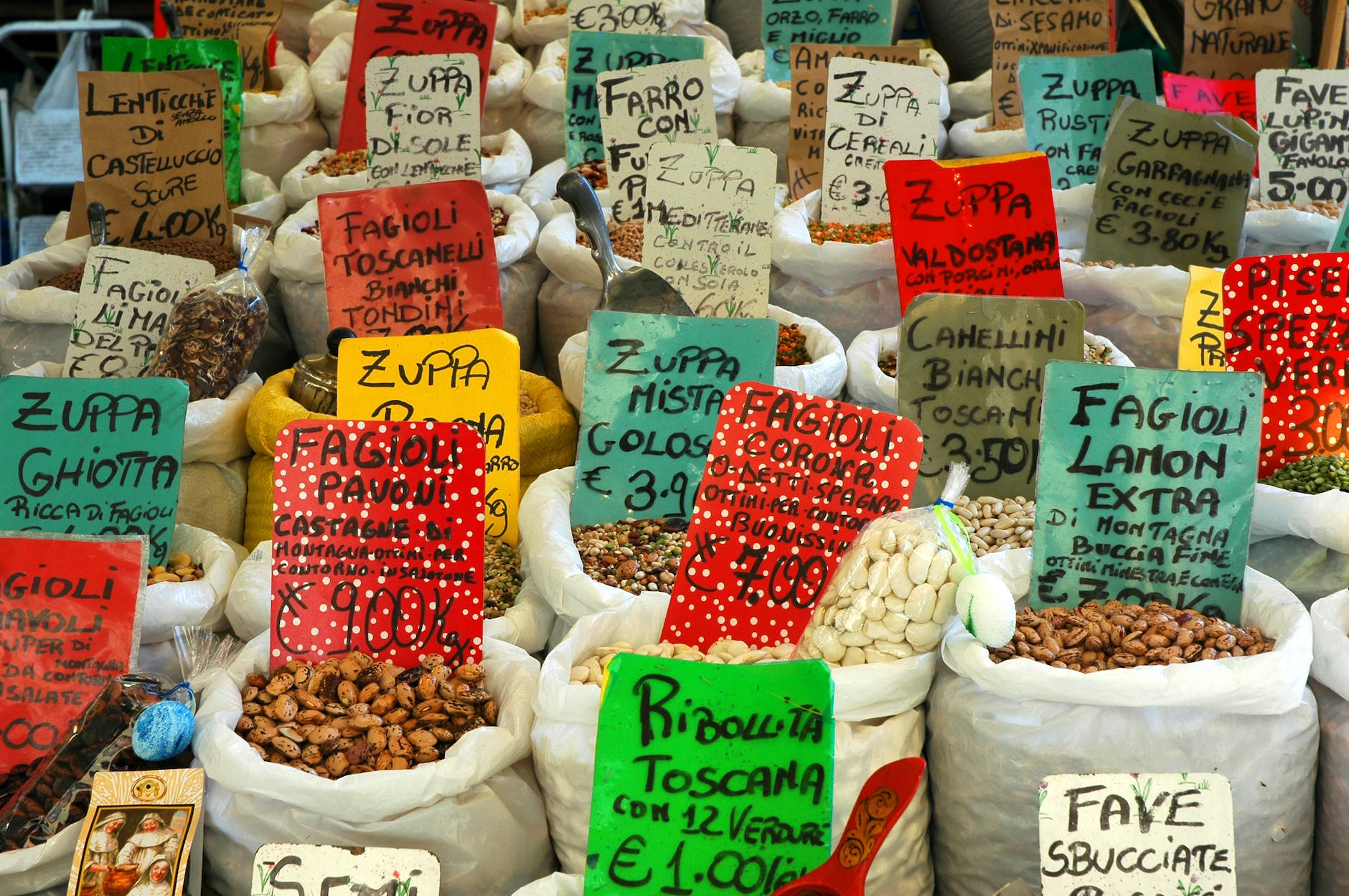 assorted beans in white sacks