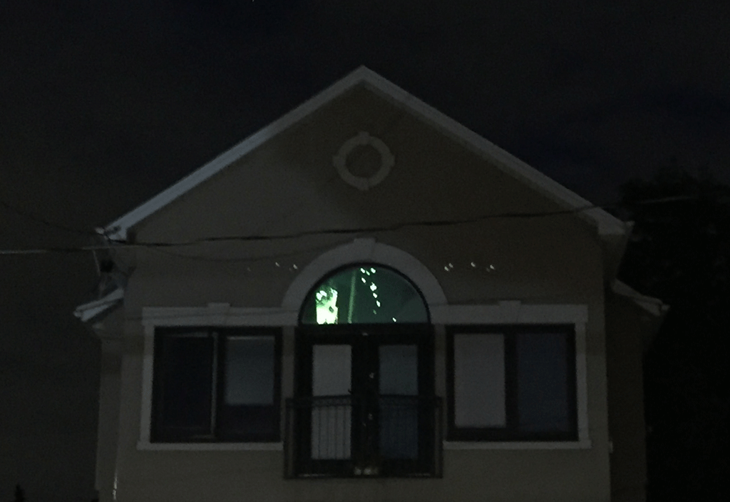 Closeup of D shaped window with projection -Life on Locke Interactive Projection
