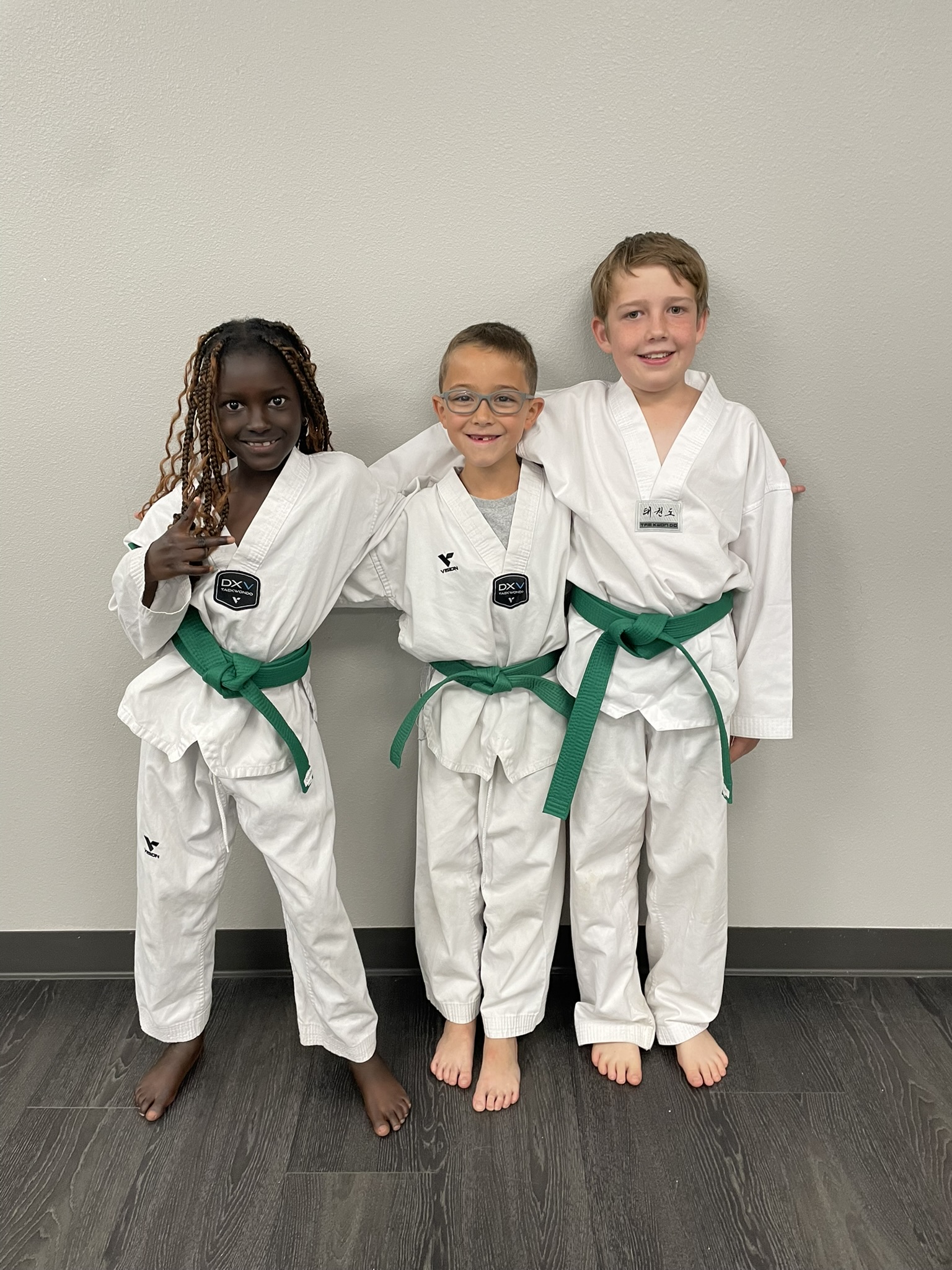 Three green belt students