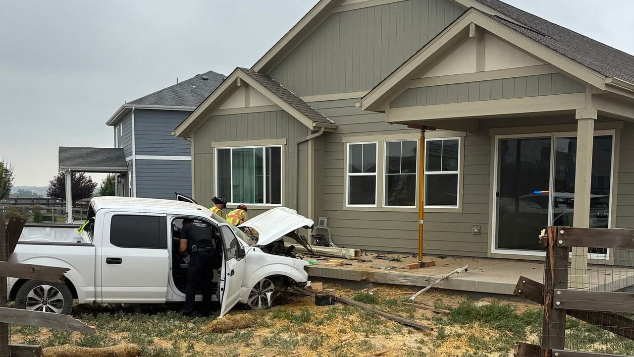 Pickup truck crashes into Firestone home, damages patio support column