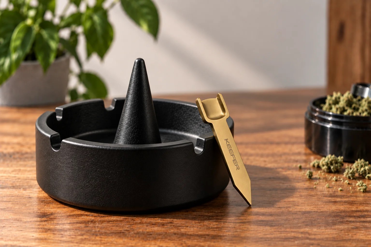 Debowler ashtray next to a multi-tool for cleaning and loading bowls