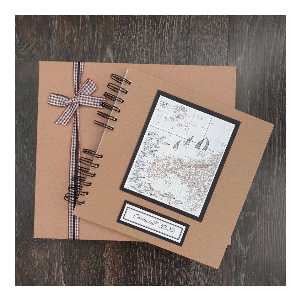 kraft brown scrapbook and gift box with cornwall illustrated map and text