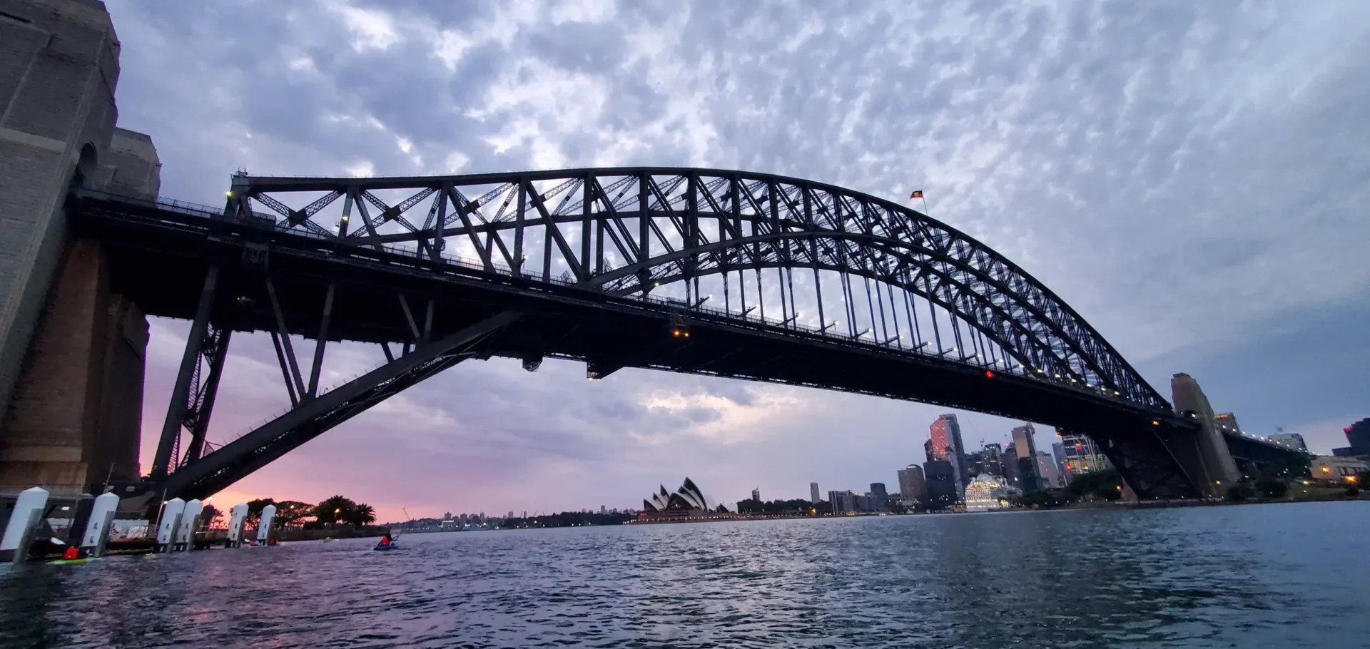 sydney harbour bridge with purple sunrise