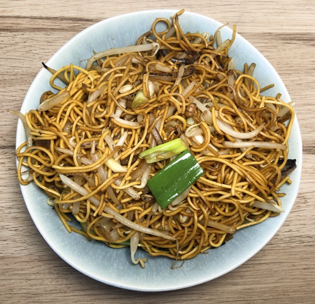 Chinese takeaway style Chow Mein with beansprouts on a serving plate.