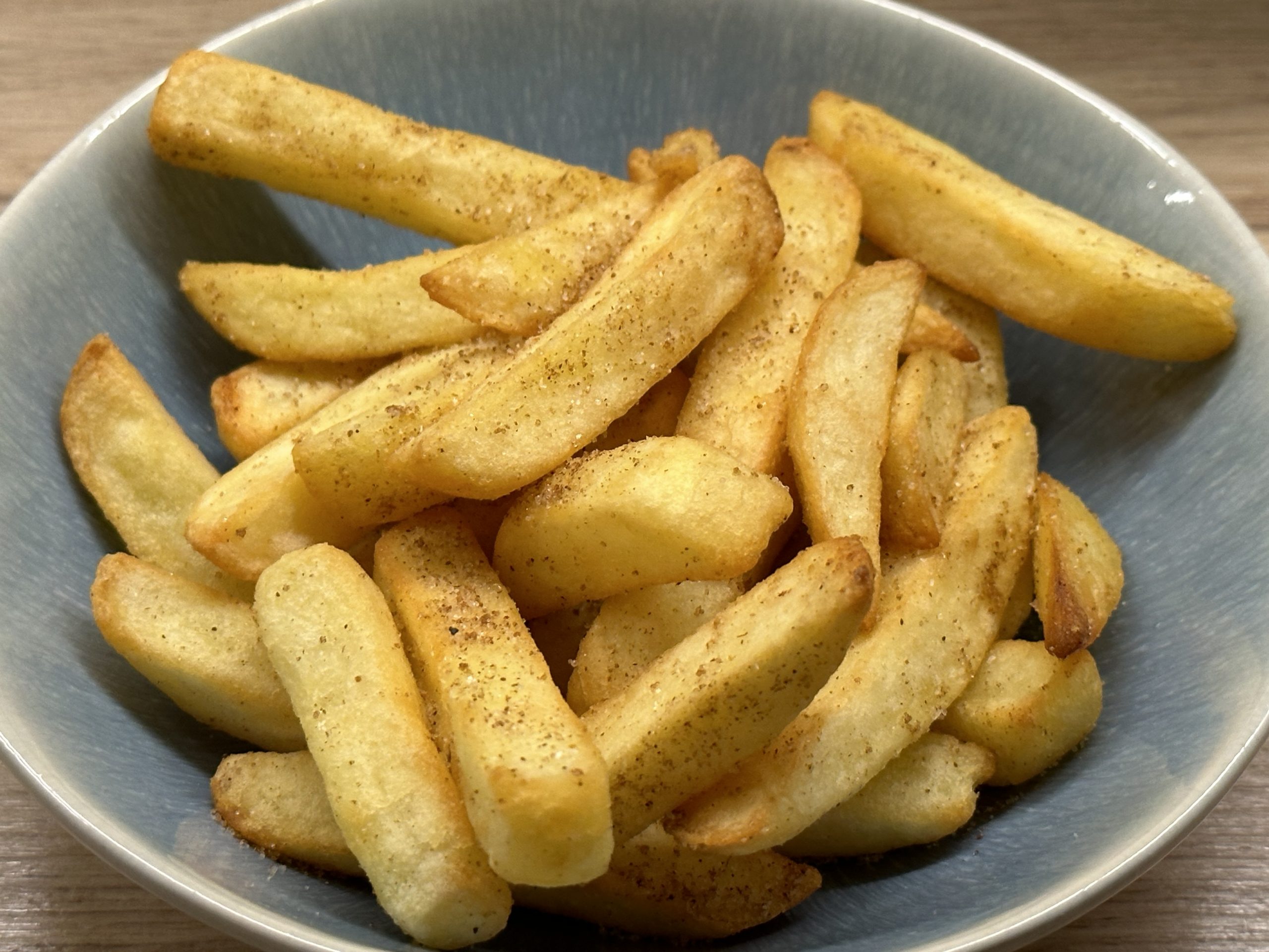 Dry style salt & pepper chips (Chinese takeaway style) in a serving bowl.