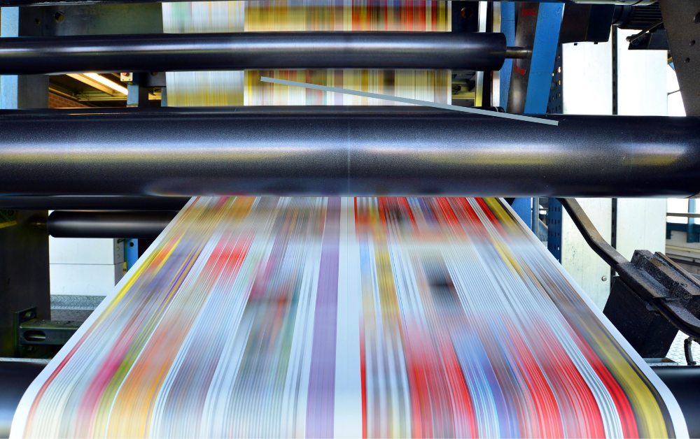 Kessler Creative’s printer producing custom direct mail marketing materials.