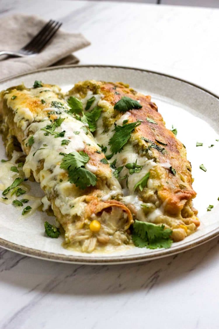 For the most authentic chicken enchiladas, corn tortillas are the way to go.