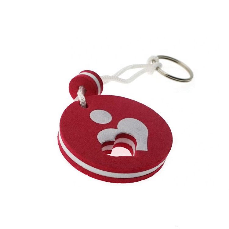 A set of different colored and shaped EVA foam floating keychains, including a red, white, and blue circular one.