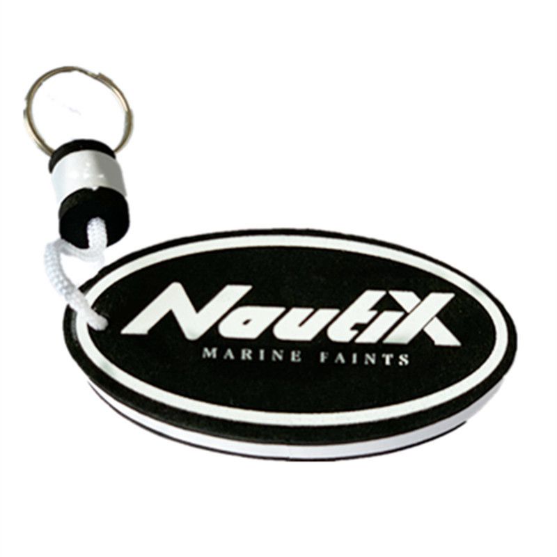 A set of different colored and shaped EVA foam floating keychains, including a green, blue, and purple circular one.