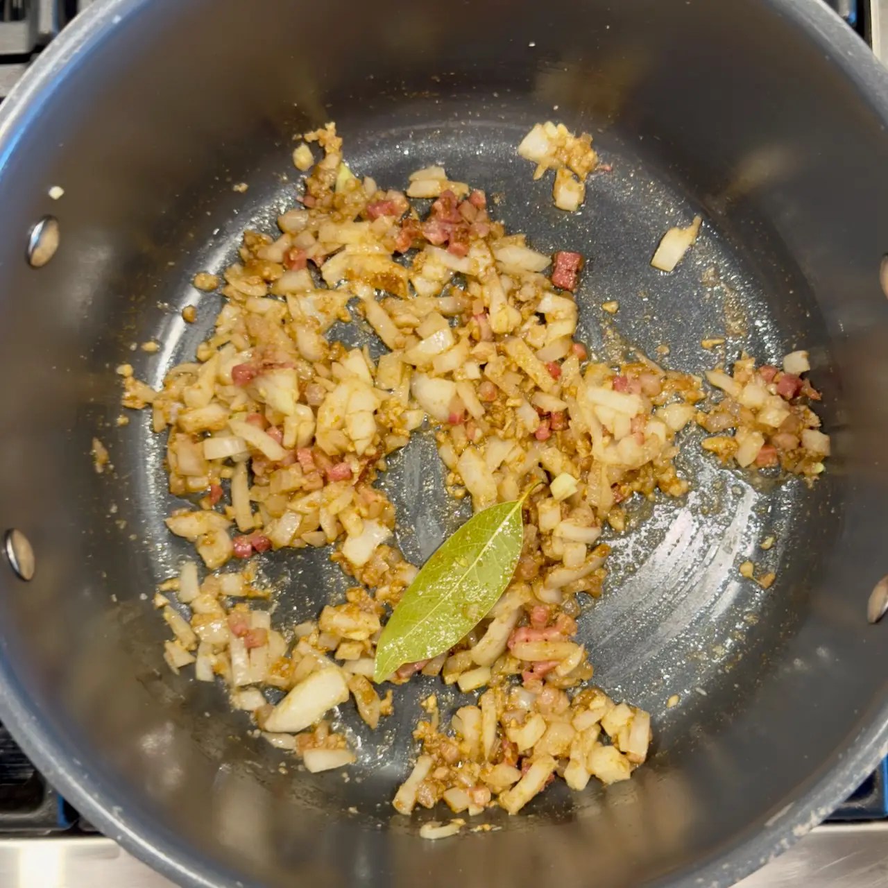 sautéed pancetta, onion, and garlic with a spice blend