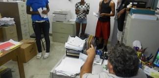 A group of people standing in a room - Davis County