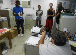 Project Idle Hands A group of people standing in a room - Davis County