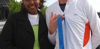 A person standing posing for the camera - T-shirt