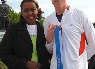 A person standing posing for the camera - T-shirt