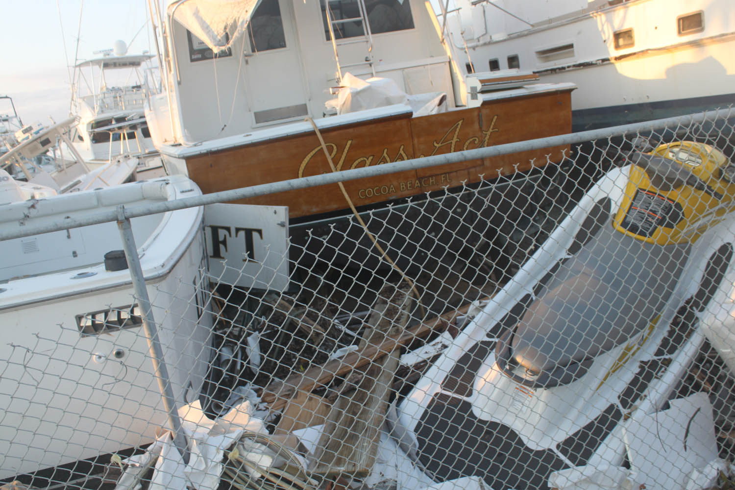 Middle Keys take a wallop - A boat docked at a dock - Yacht