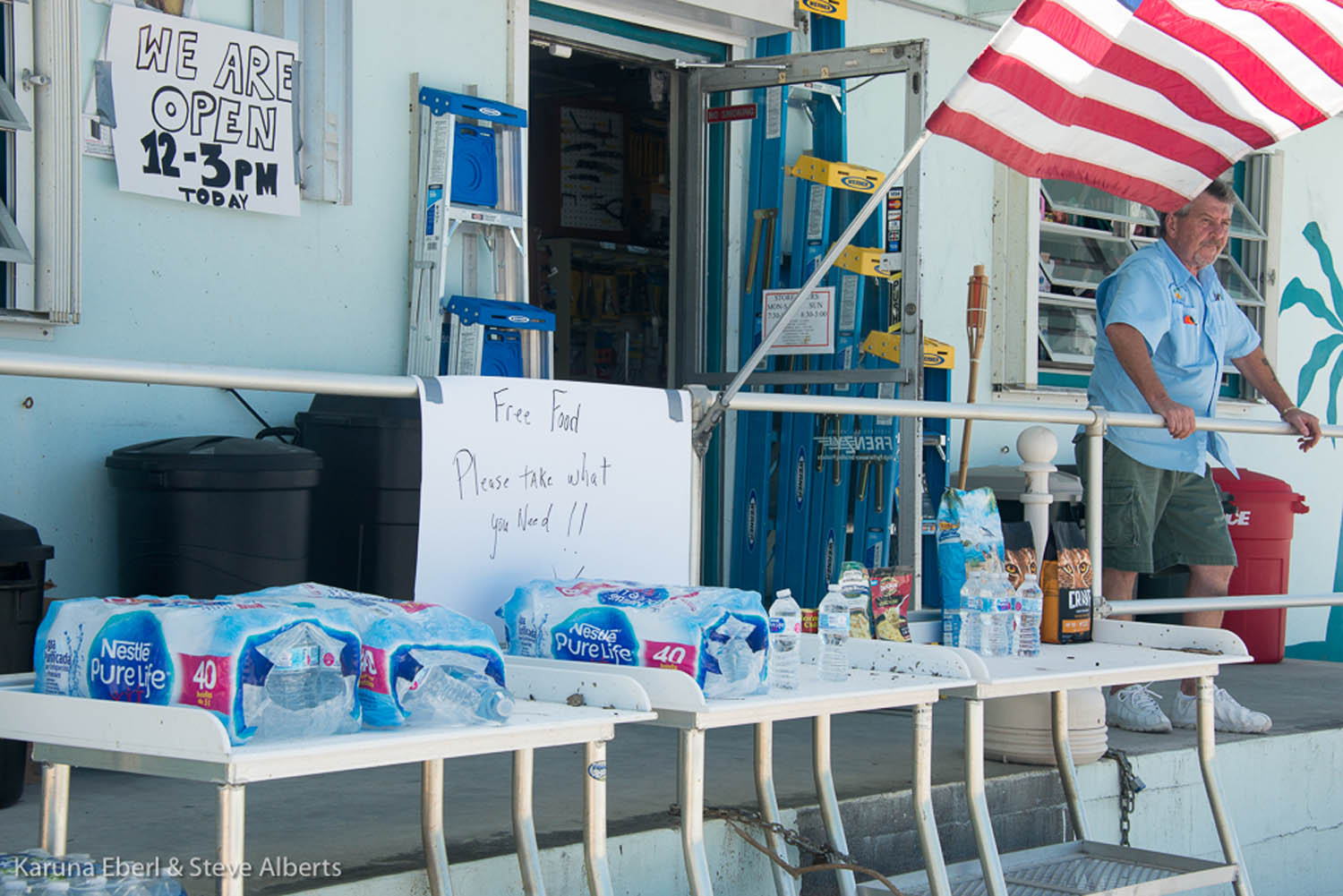 Area looks like a ‘blast zone’ - A person standing in front of a store - Product