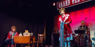 A person standing on a stage - Musical theatre
