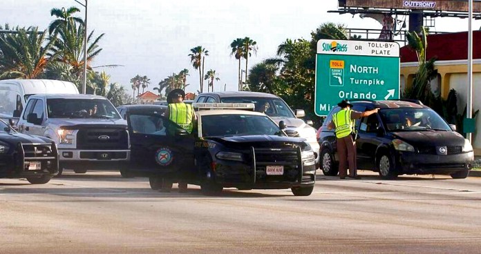 reentry Learning process - A police car parked on a city street - Florida Keys