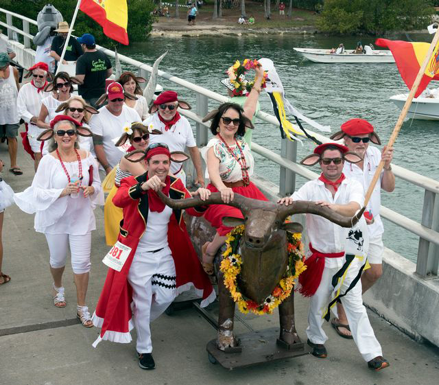 Moooove It: Cow Key Zero K on the horizon - A group of people wearing costumes - Cow Key