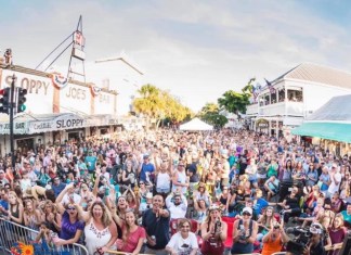 Songwriters Fest Hits Key West with Free Show by Brad Paisley - A group of people standing in front of a crowd - Key West