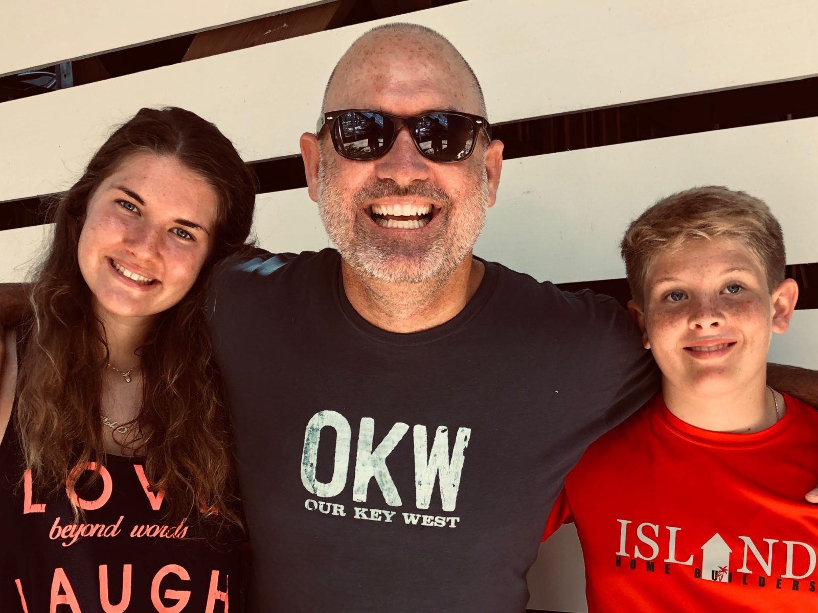 Familiar Faces of Fathers from Key West, Marathon, and the Upper Keys - A couple of people posing for a photo - Jim Valvano