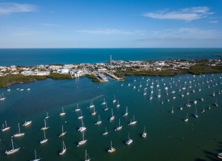 NEW LONG-TERM ANCHORING PERMIT REQUIRED FOR VESSELS IN FLORIDA WATERS a large body of water filled with lots of boats