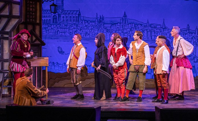 Something-Rotten a group of people standing on top of a stage