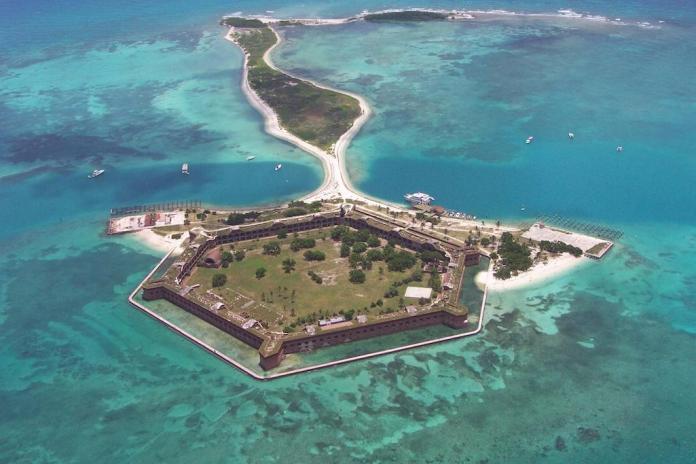TORTUGAS an aerial view of an island in the middle of the ocean