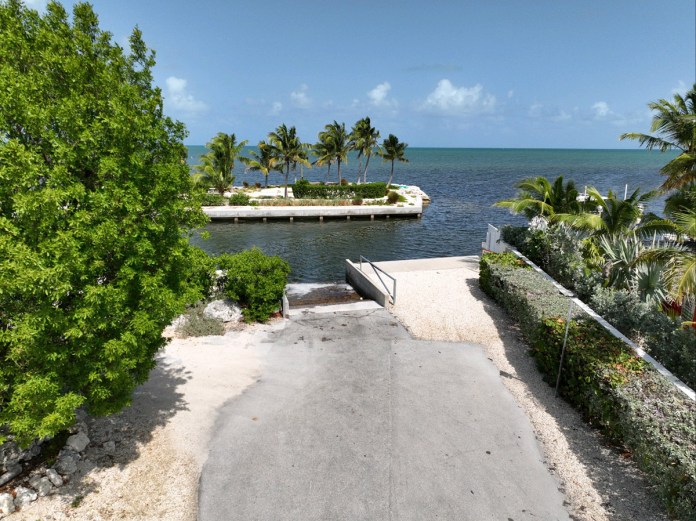 a view of the ocean from a house