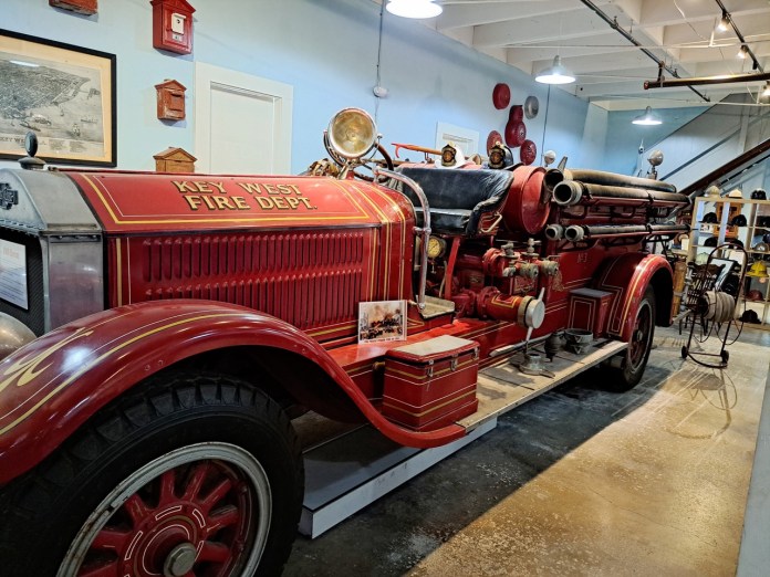 fire engine Large an old fire truck is on display in a museum