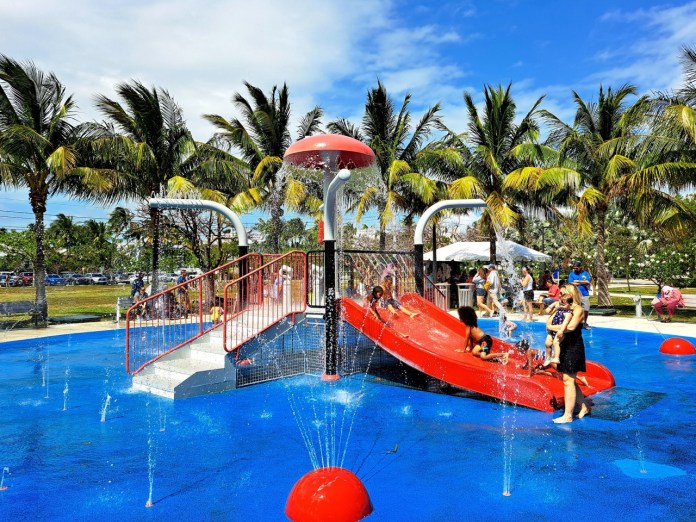 splash pad Large a children's water park with a red slide
